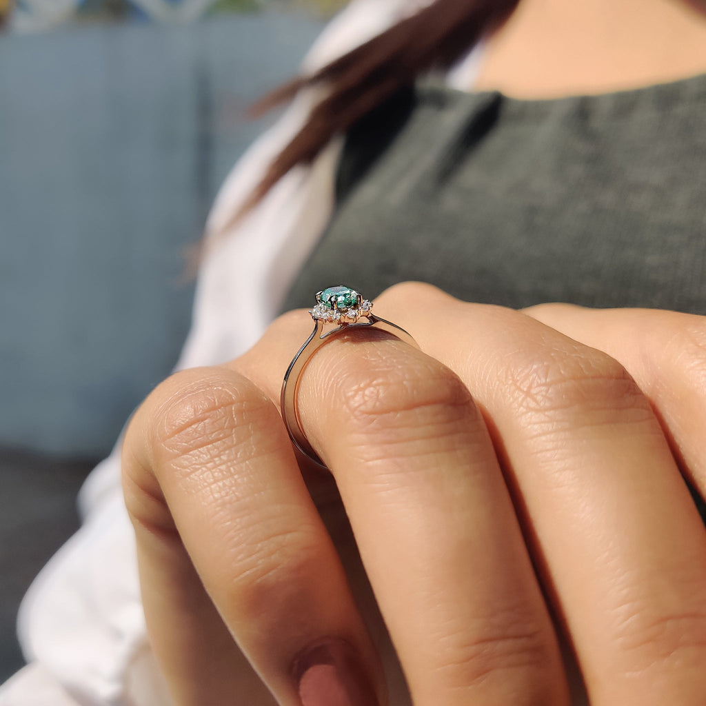Oval Halo Engagement Ring In Cathedral Setting