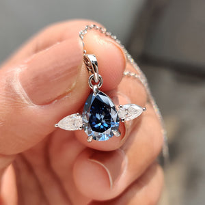 Three Stone Pendant With Royal Dark Blue Pear Moissanite
