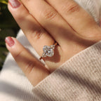 Oval Diamond Ring With Round Cut Side Stone