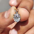 Oval Cut Moissanite Pendant In Solitaire Bunny Ear Bail