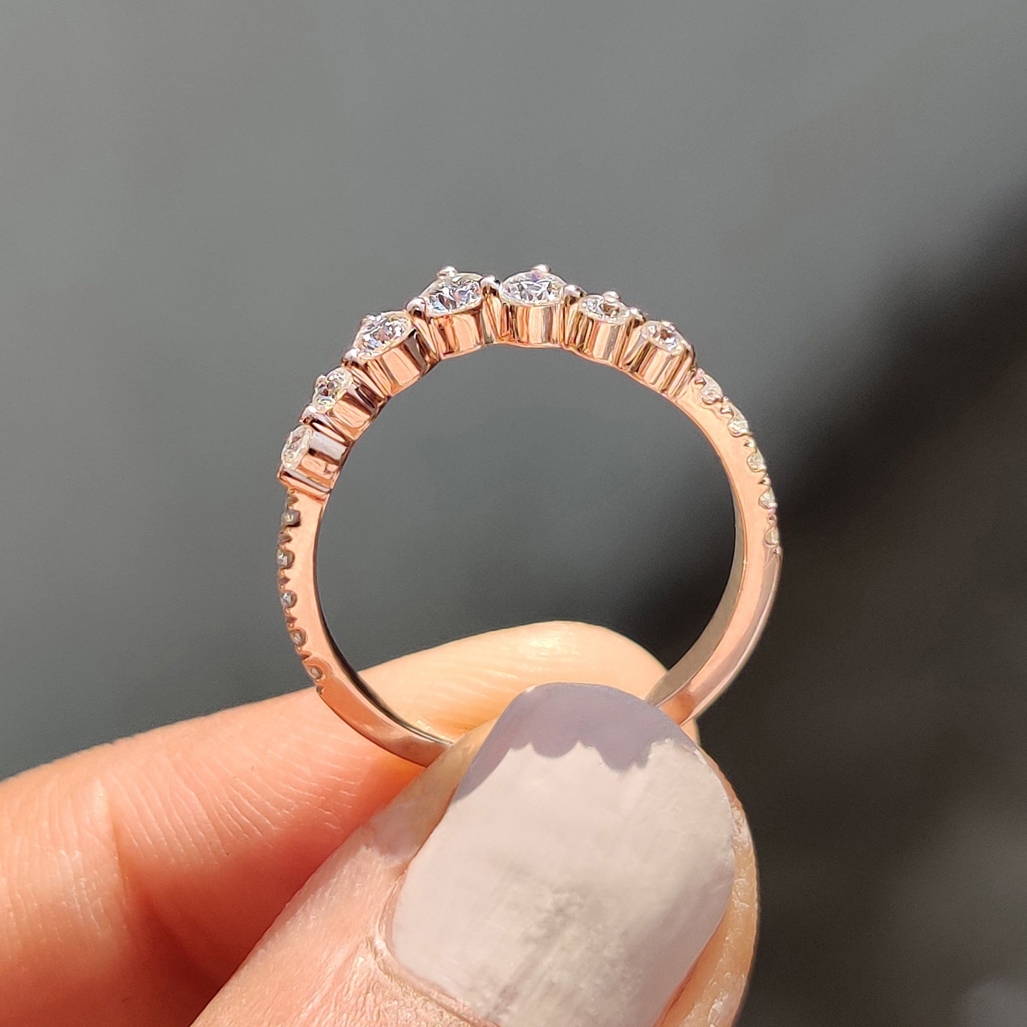 Curvy Wedding Band With Round Cut Moissanite