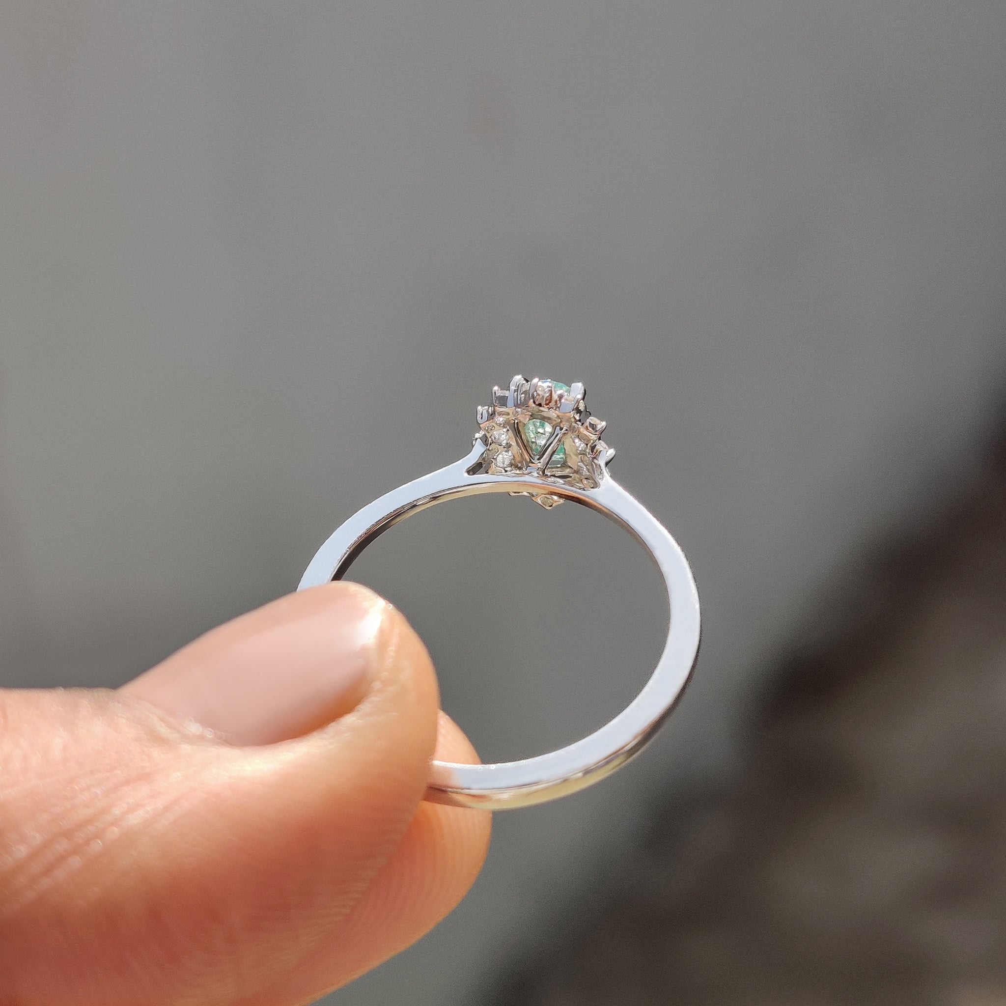 Oval Halo Engagement Ring In Cathedral Setting