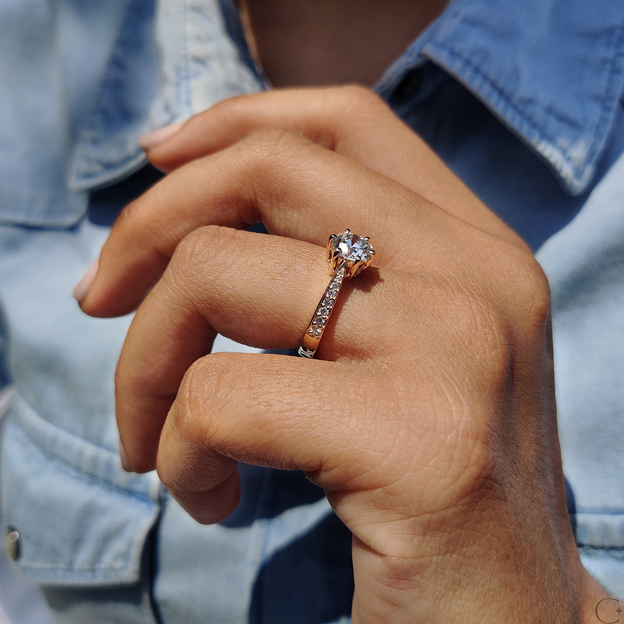 Round Cut Engagement Ring with Tapered Pave Setting