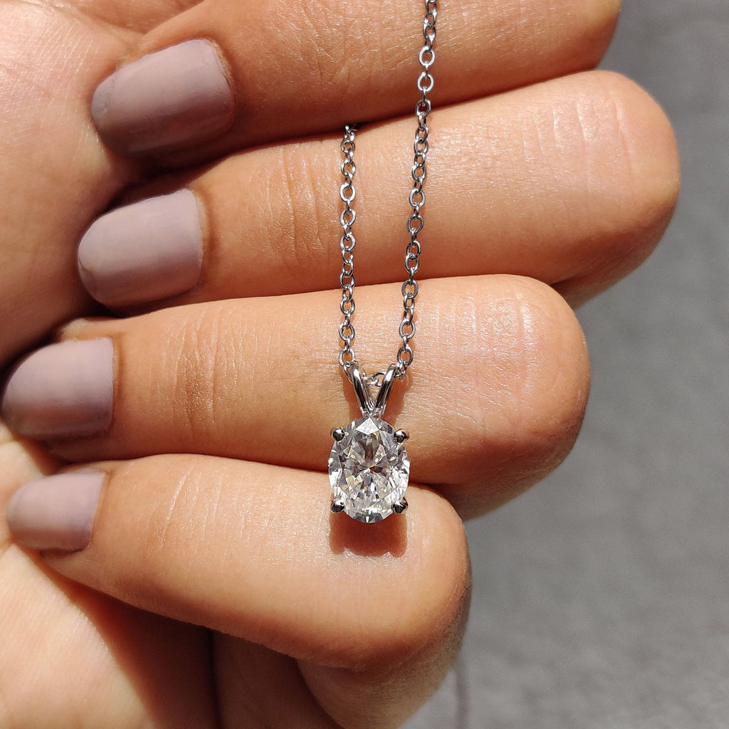 Oval Cut Moissanite Pendant In Solitaire Bunny Ear Bail