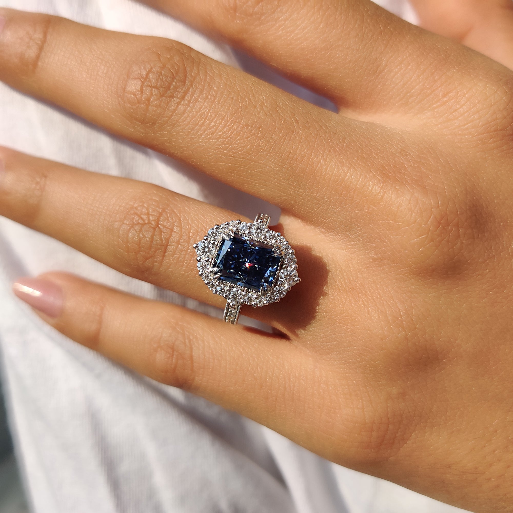 Radiant Halo Engagement Ring With Cathedral Setting