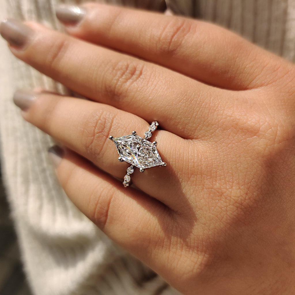 Dutch Marquise Engagement Ring With Marquise And Round Side Stone