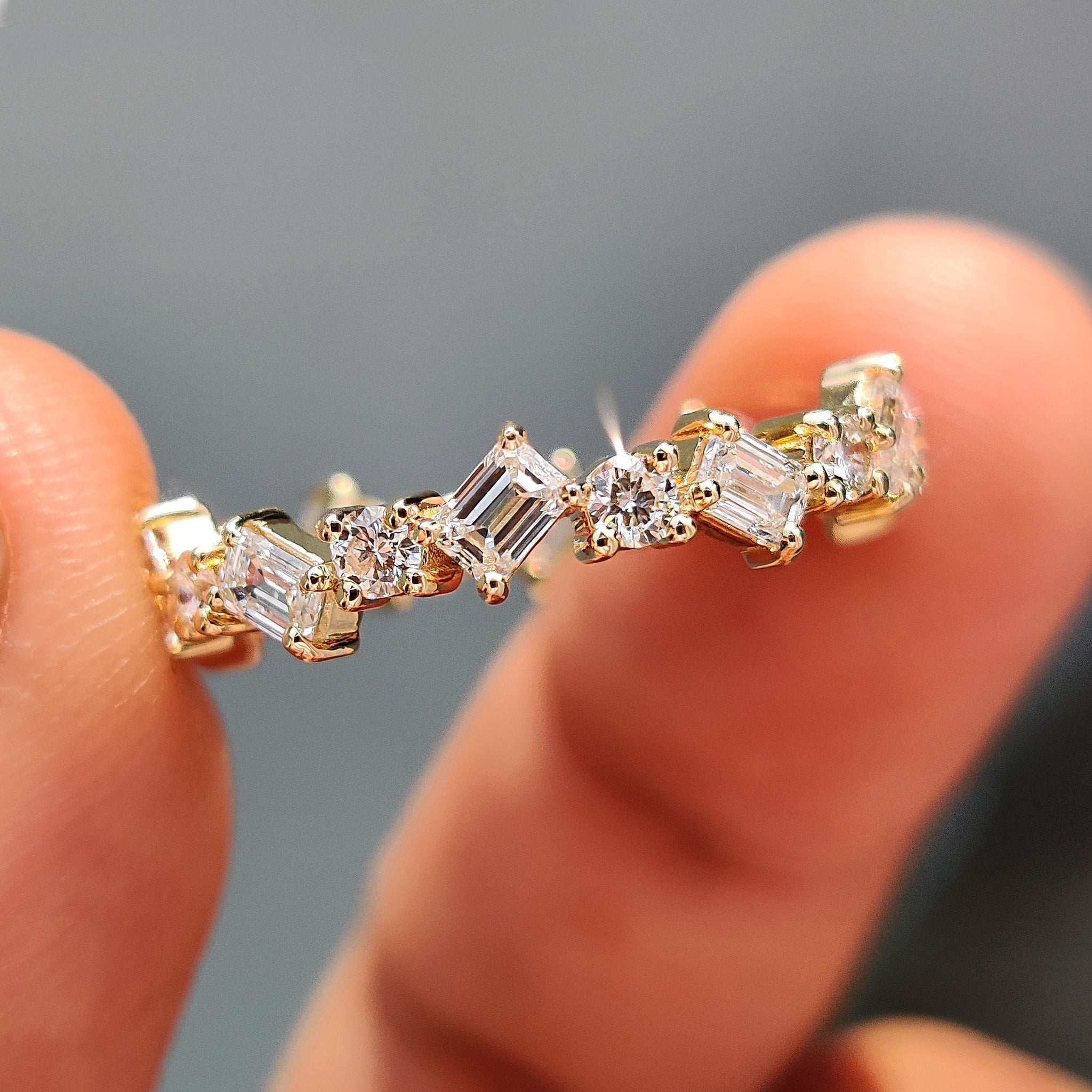 Zig Zag Band Featuring Emerald and Round Cut Diamond Main image