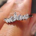 Curved Wedding Band With Marquise And Baguette Stone