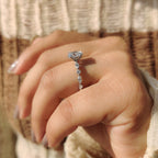 Oval Cut Engagement Ring With Round And Marquise Side Stones
