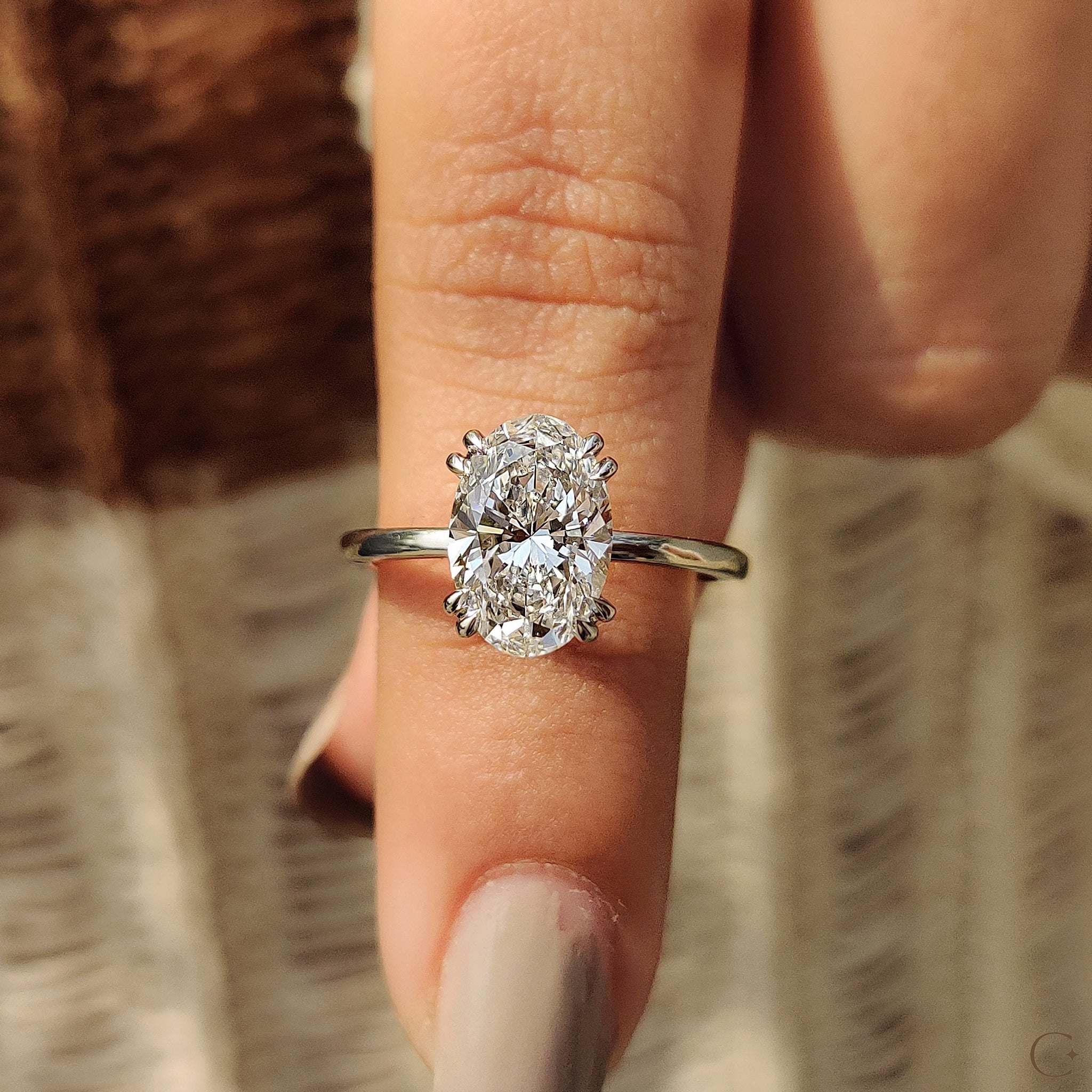 Oval Shaped Diamond Engagement Ring In Solitaire Style