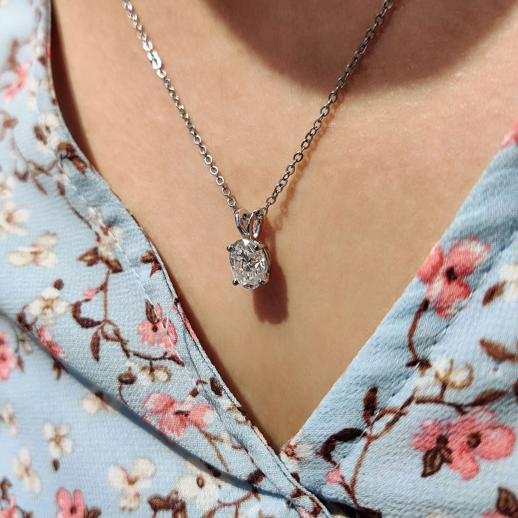 Oval Cut Moissanite Pendant In Solitaire Bunny Ear Bail