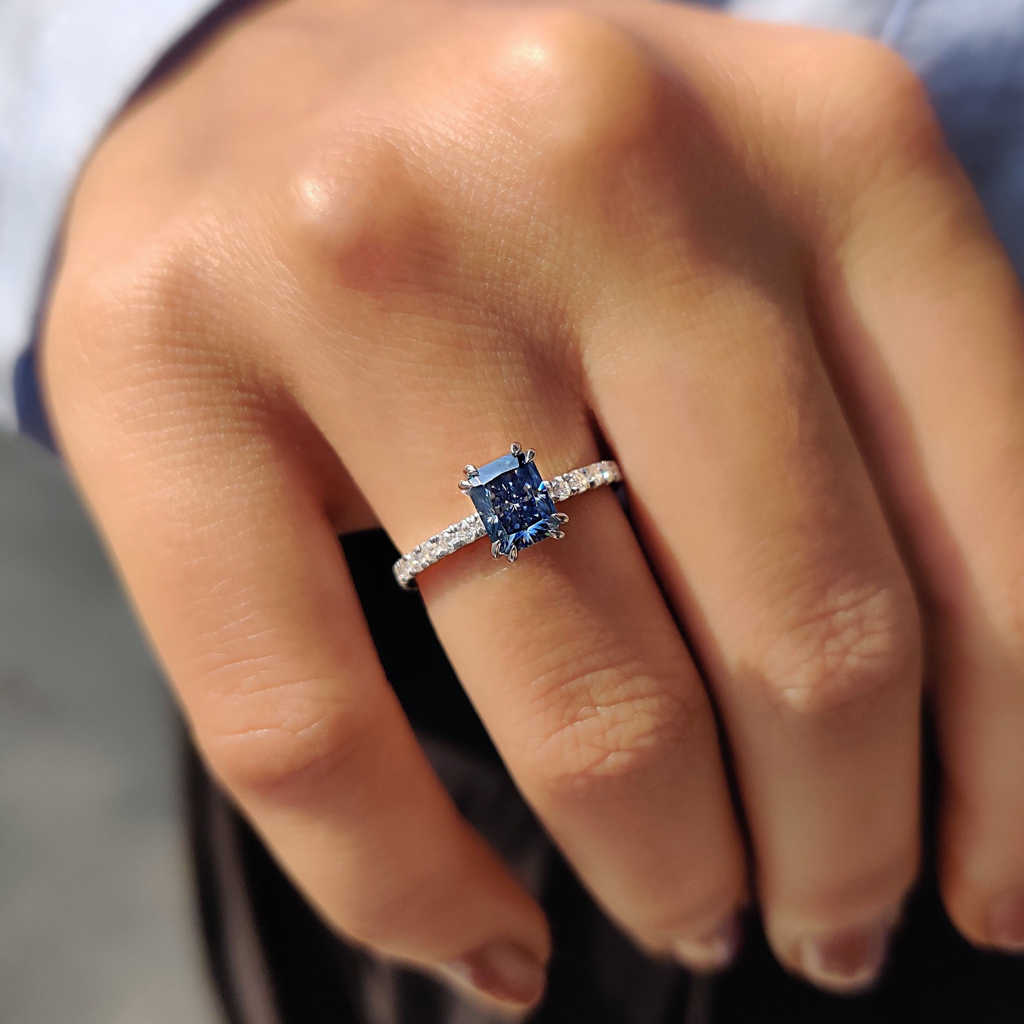 Radiant Cut Blue Moissanite Ring In Pave Setting