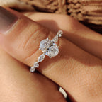 Oval Cut Engagement Ring With Round And Marquise Side Stones