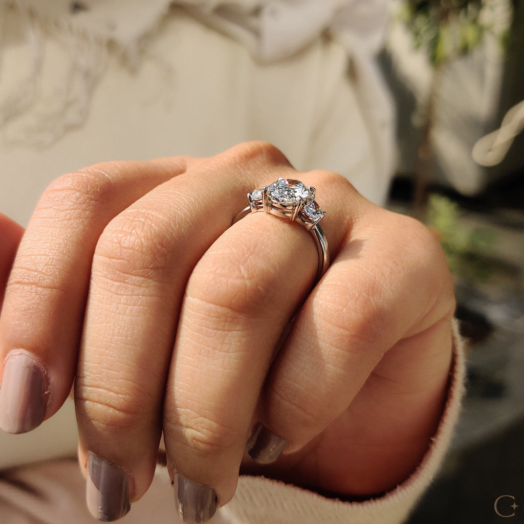 Three Stone Oval Engagement Ring With Half Moon Cut