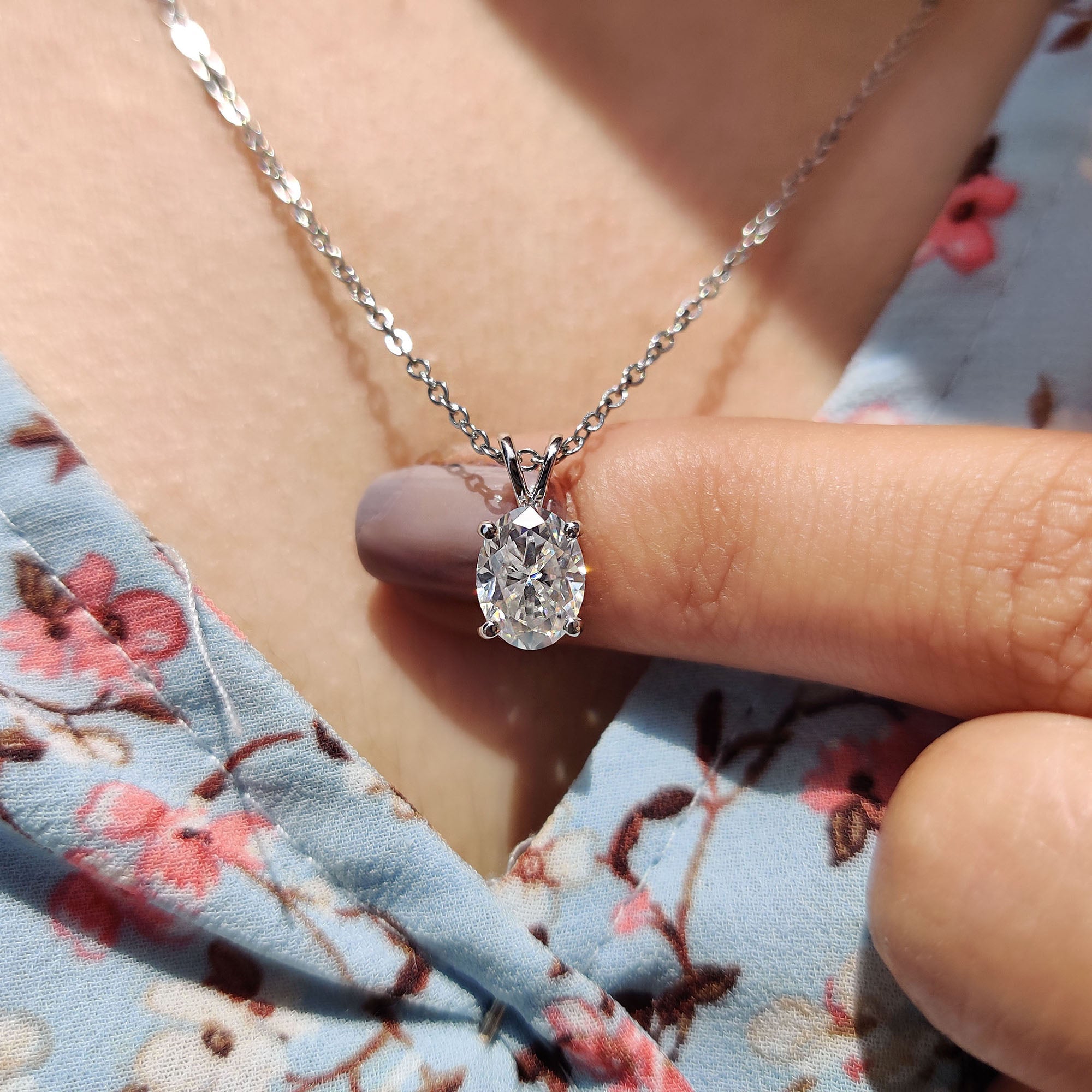 Oval Cut Moissanite Pendant In Solitaire Bunny Ear Bail