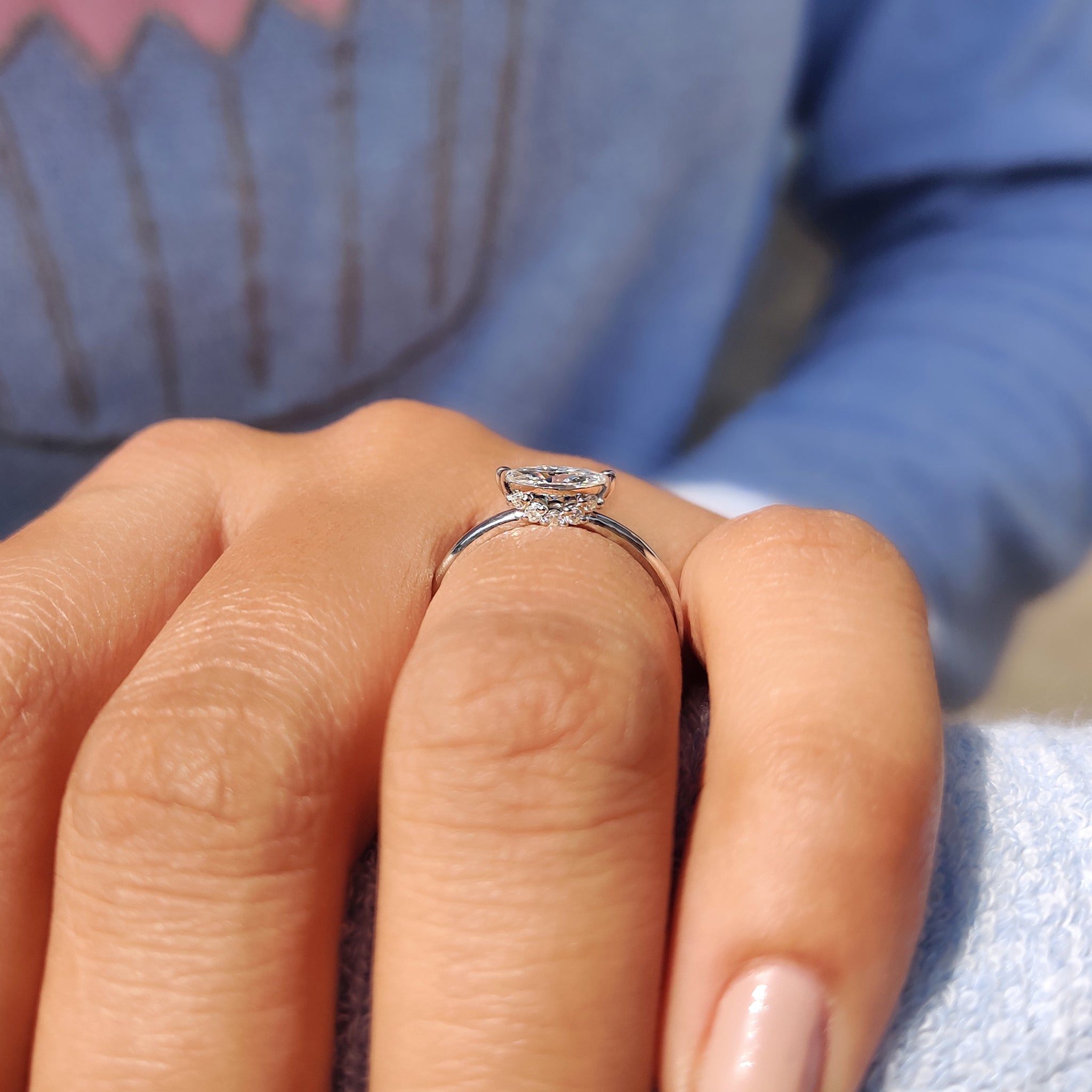 Round Side Stone With East West Marquise Ring