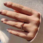 Curvy Wedding Band In Round Moissanite Stone