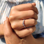 Curvy Wedding Band With Round Cut Moissanite