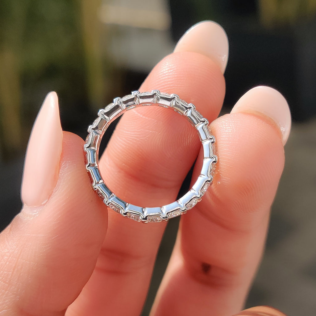 Round Cut Eternity Band In Secure Prong Setting