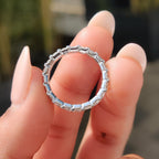 Round Cut Eternity Band In Secure Prong Setting
