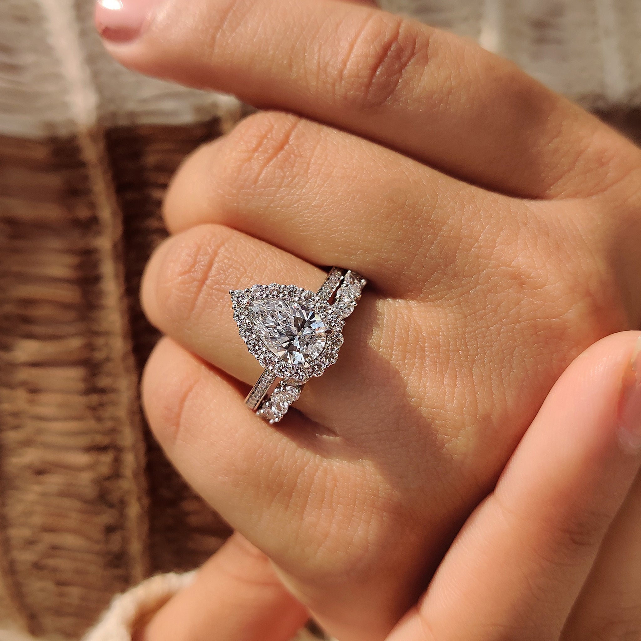 Pear Shaped Diamond Bridal Set With Round Halo Style