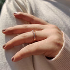 Curvy Wedding Band In Round Moissanite Stone
