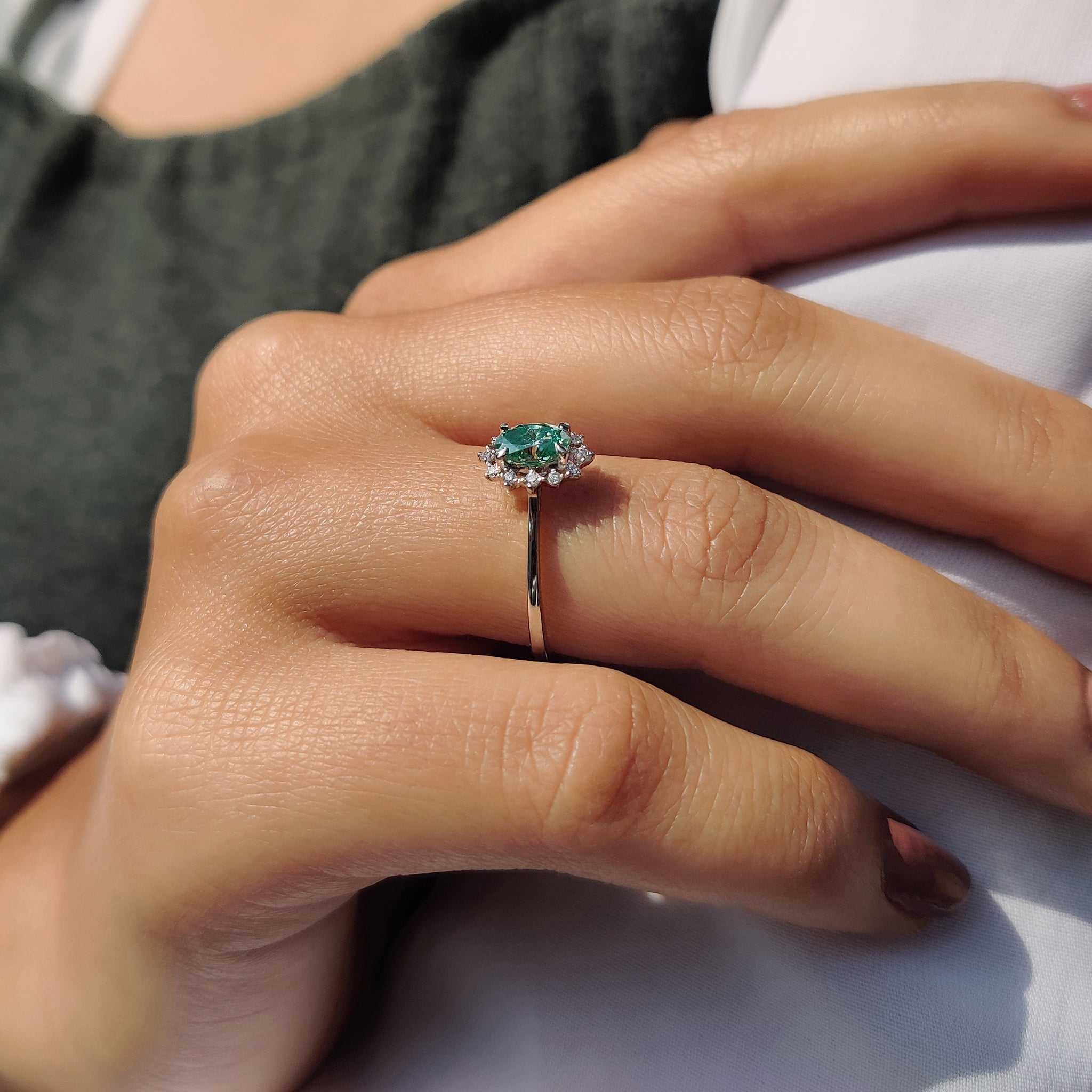 Oval Halo Engagement Ring In Cathedral Setting