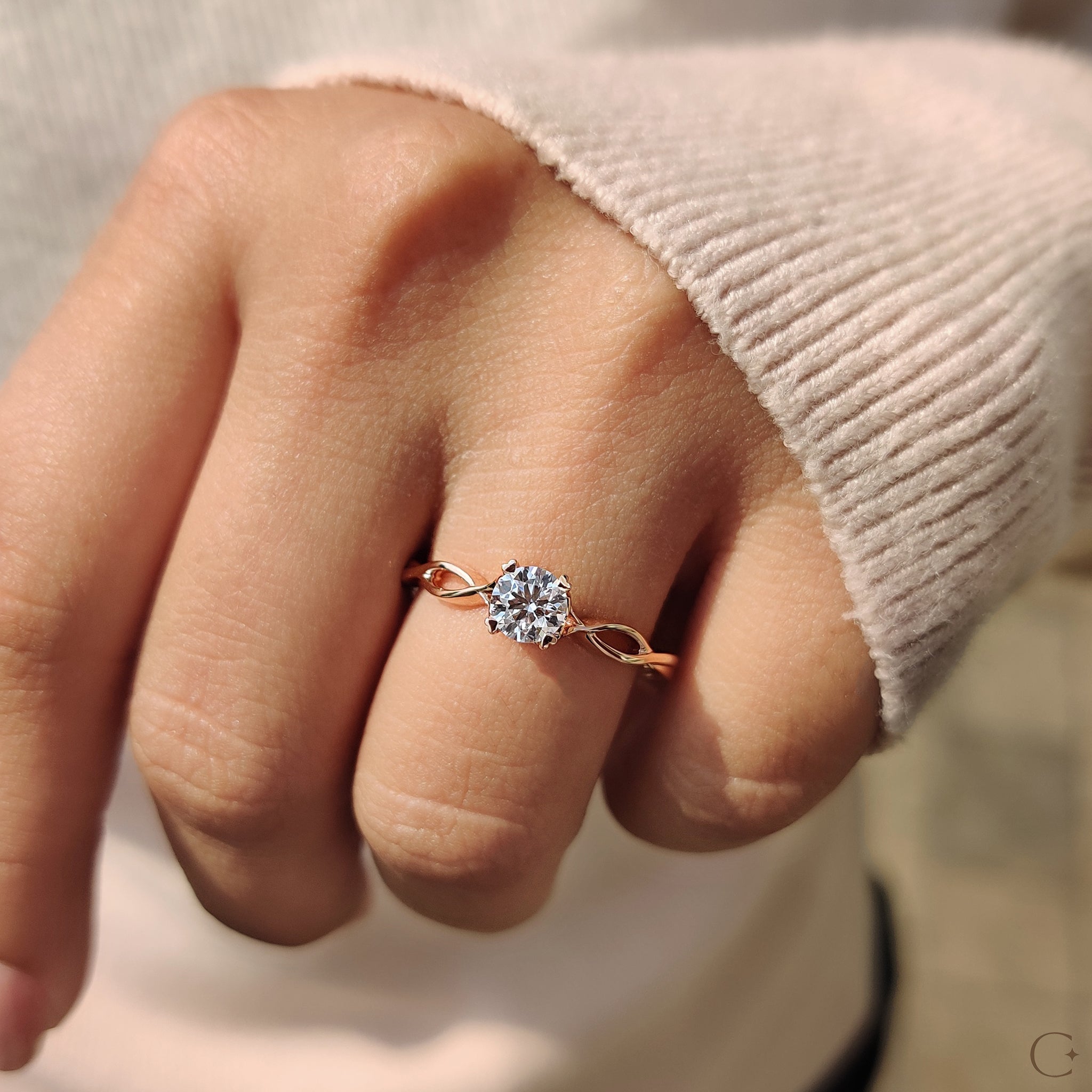 Round Solitaire Engagement Ring With Twisted Shank Band