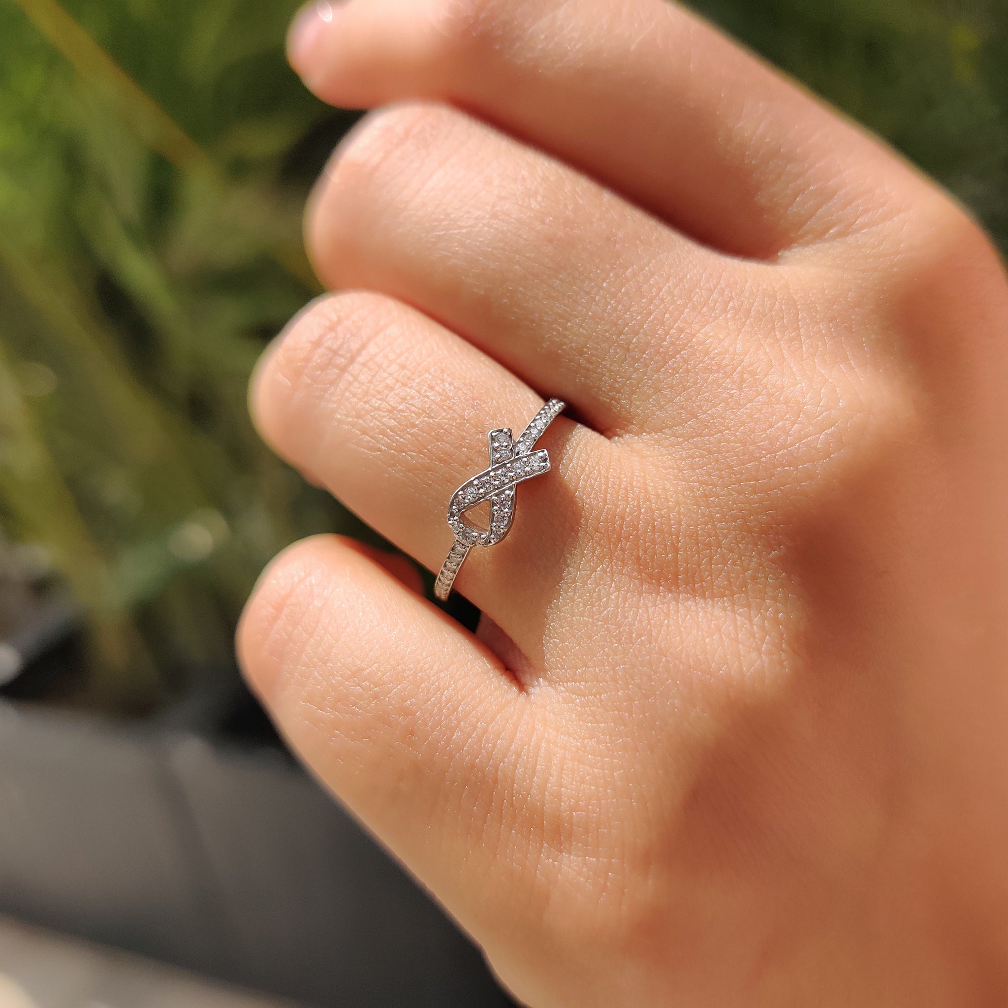 Round Diamond Ribbon Ring In Half Eternity Style