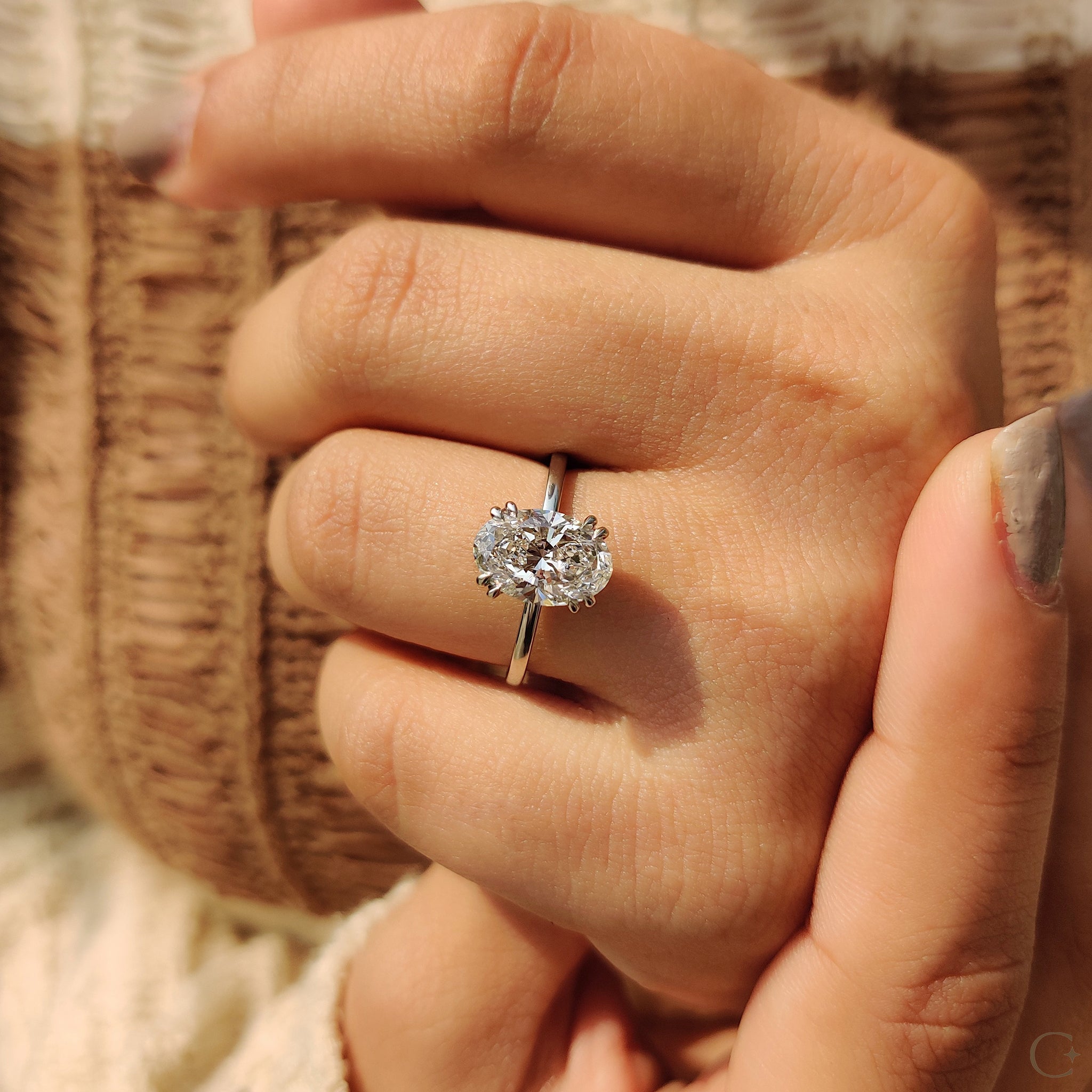 Oval Shaped Diamond Engagement Ring In Solitaire Style Secondary image