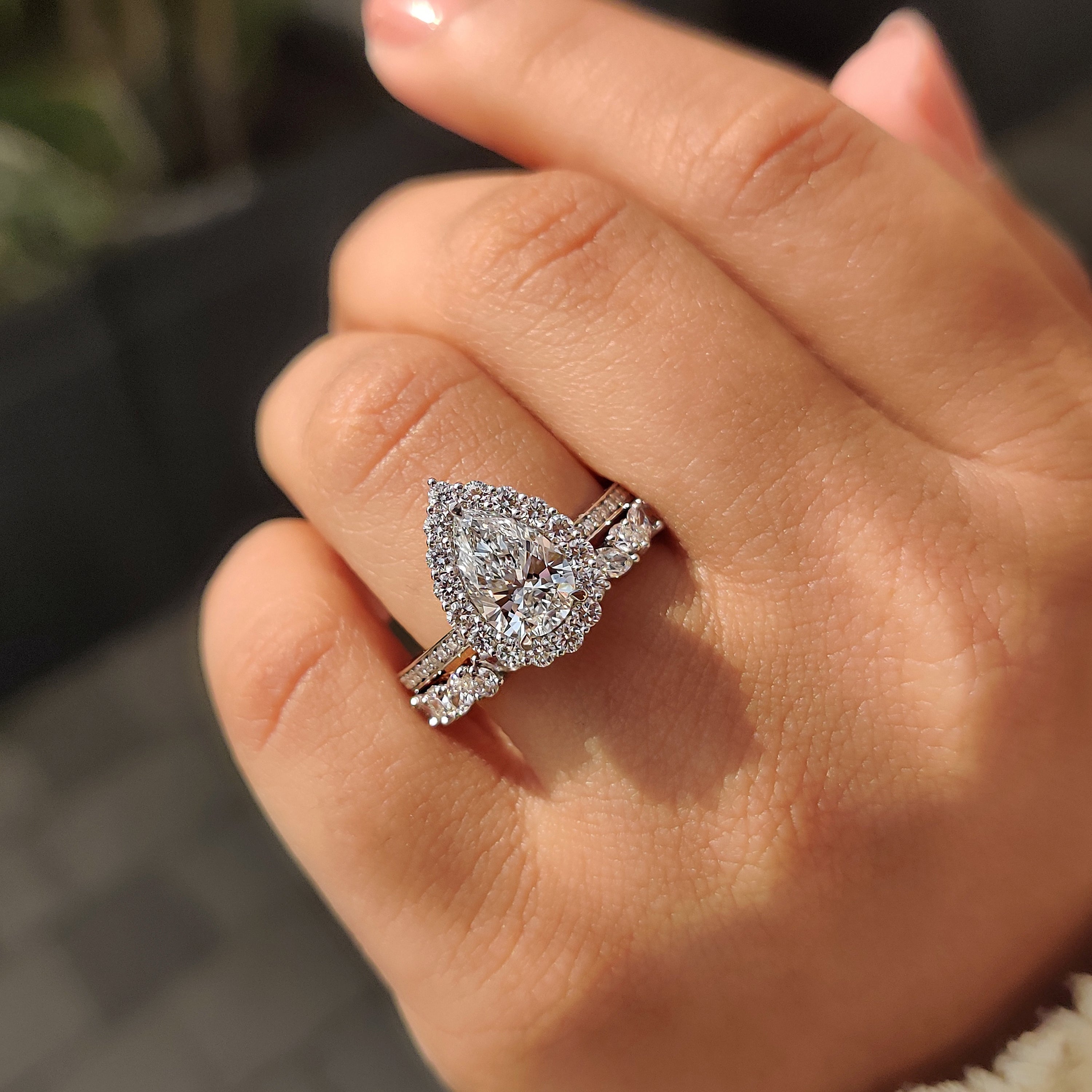 Pear Shaped Diamond Bridal Set With Round Halo Style