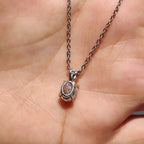Oval Cut Moissanite Pendant In Solitaire Bunny Ear Bail