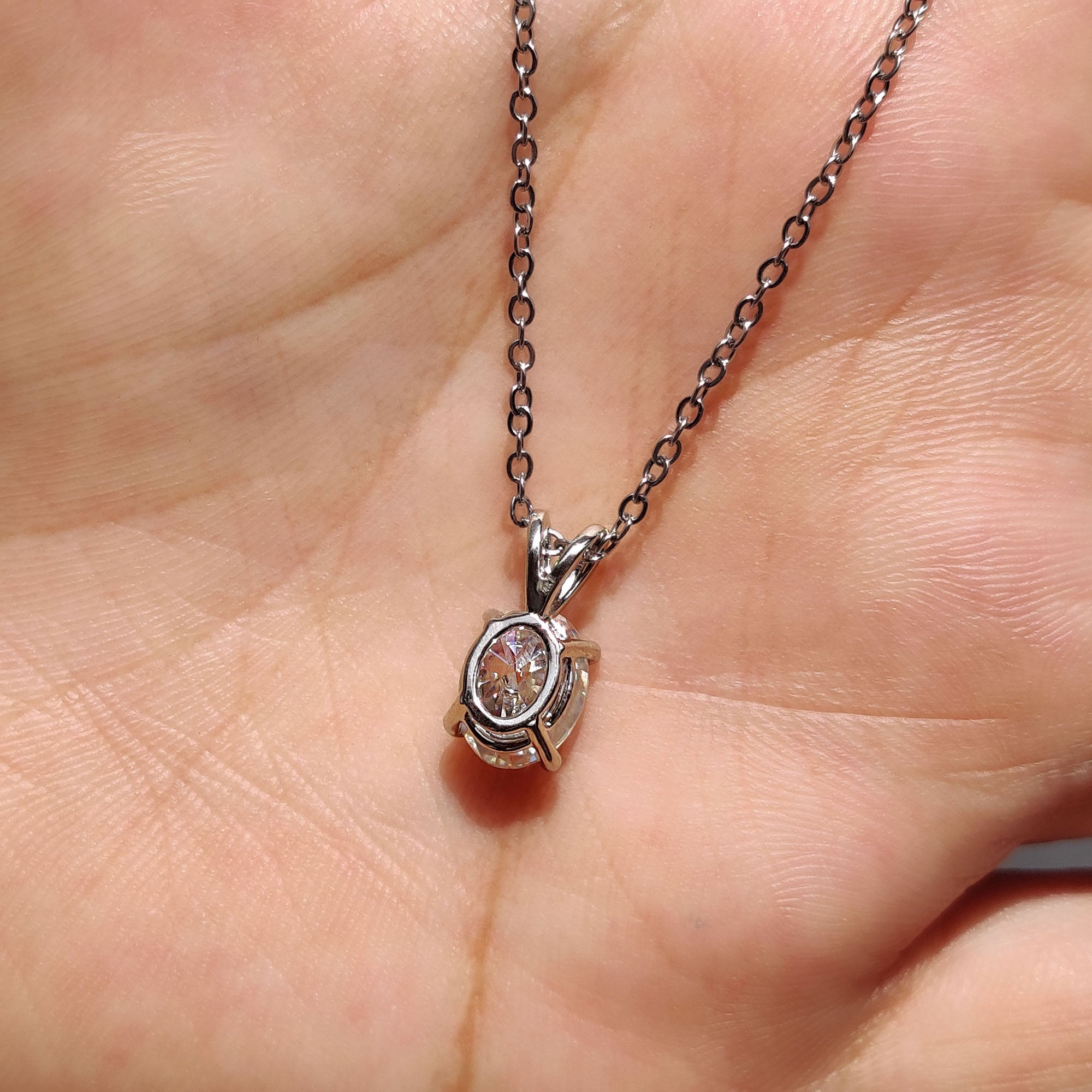 Oval Cut Moissanite Pendant In Solitaire Bunny Ear Bail