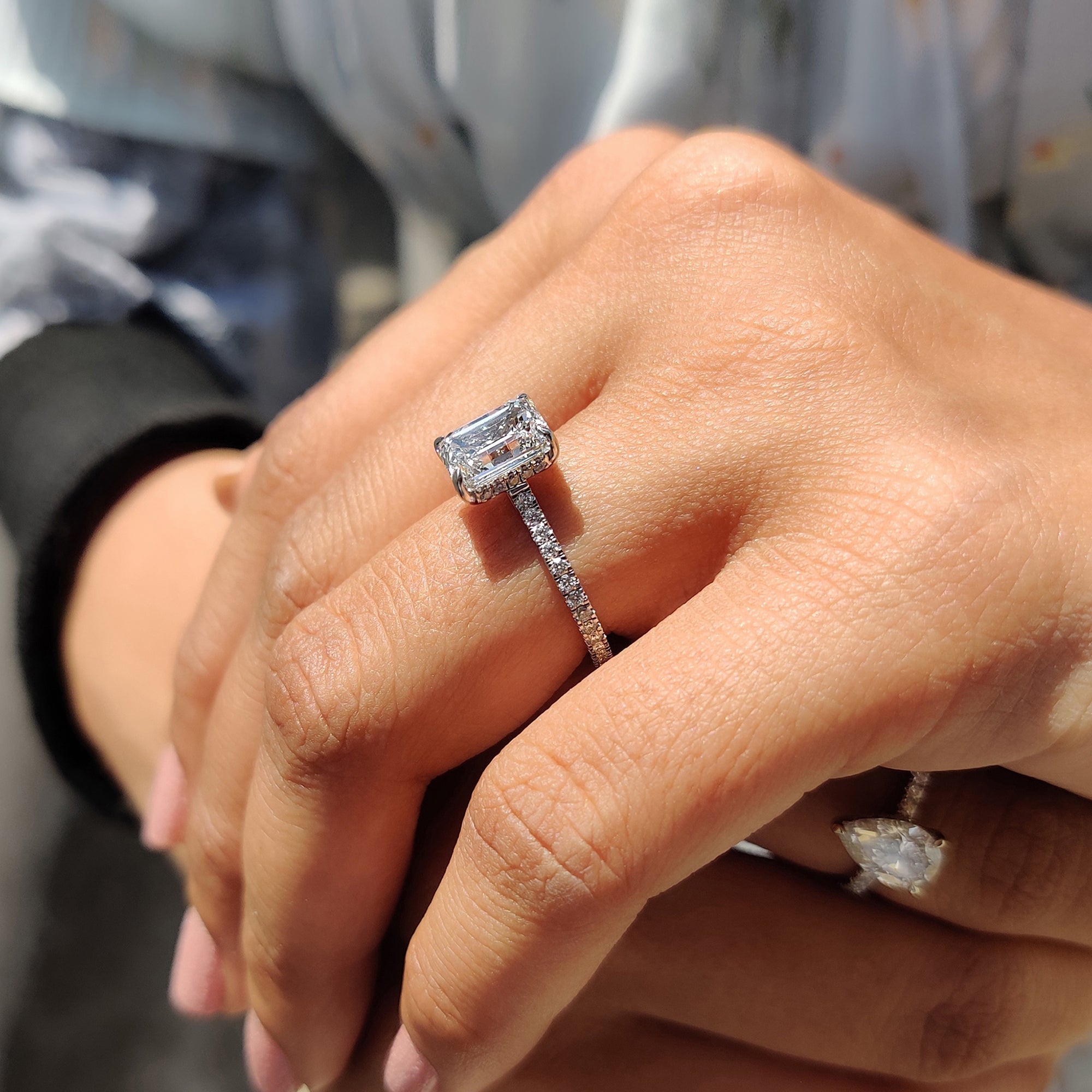 White Gold Emerald Cut Engagement Ring In Hidden Halo Design