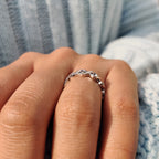 Twisted Wedding Band With Round Cut Moissanite