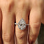 Pear Shaped Halo Engagement Ring In Round Cut Halo Style