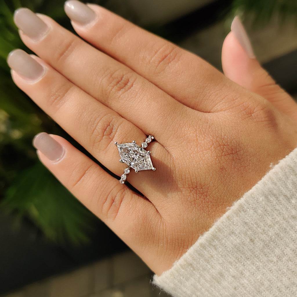Dutch Marquise Engagement Ring With Marquise And Round Side Stone