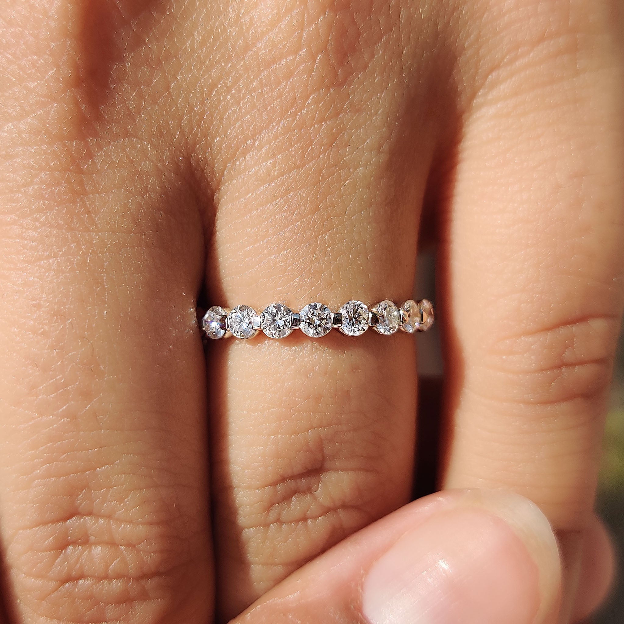 Shared Prong Eternity Band With Round Diamond