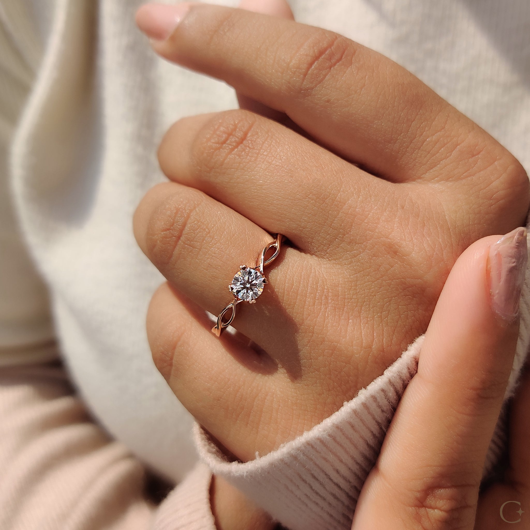 Round Solitaire Engagement Ring With Twisted Shank Band