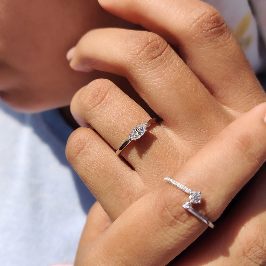 Round Side Stone With East West Marquise Ring