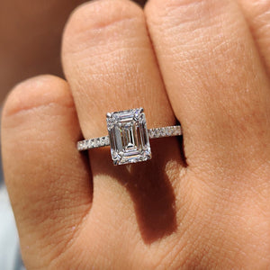 White Gold Emerald Cut Engagement Ring In Hidden Halo Design