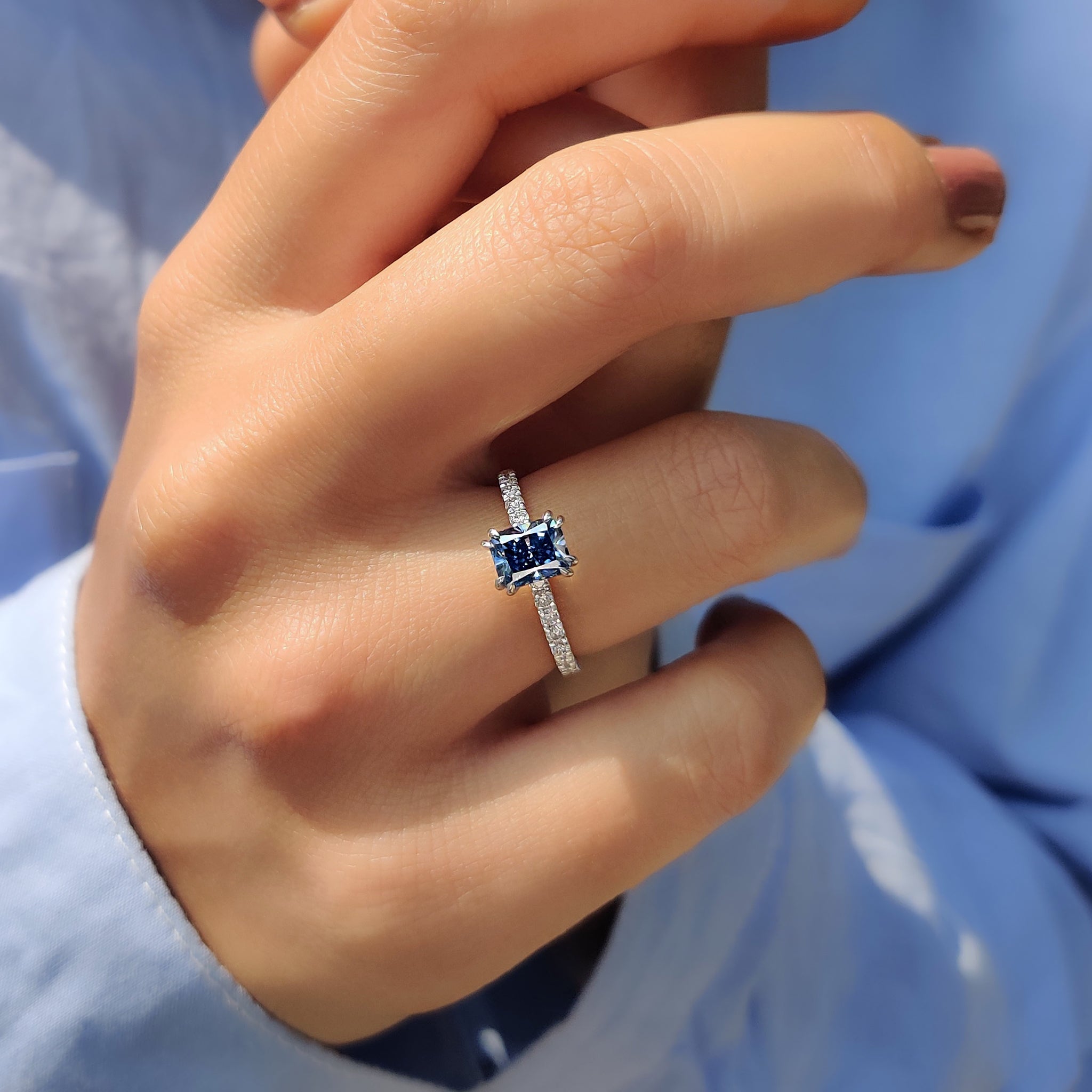 Radiant Cut Blue Moissanite Ring In Pave Setting