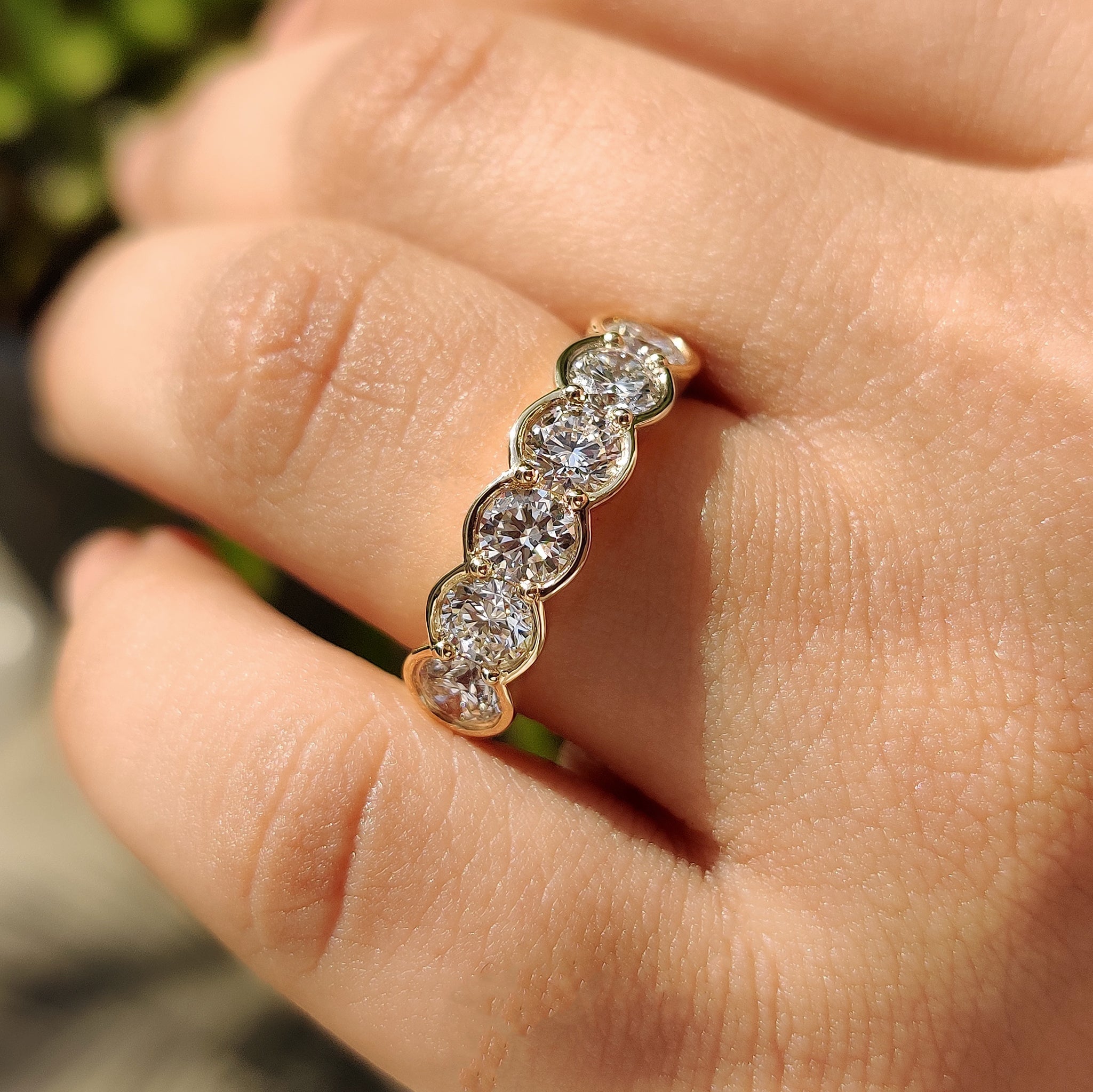Round Diamond Wedding Band In Half Bezel Setting