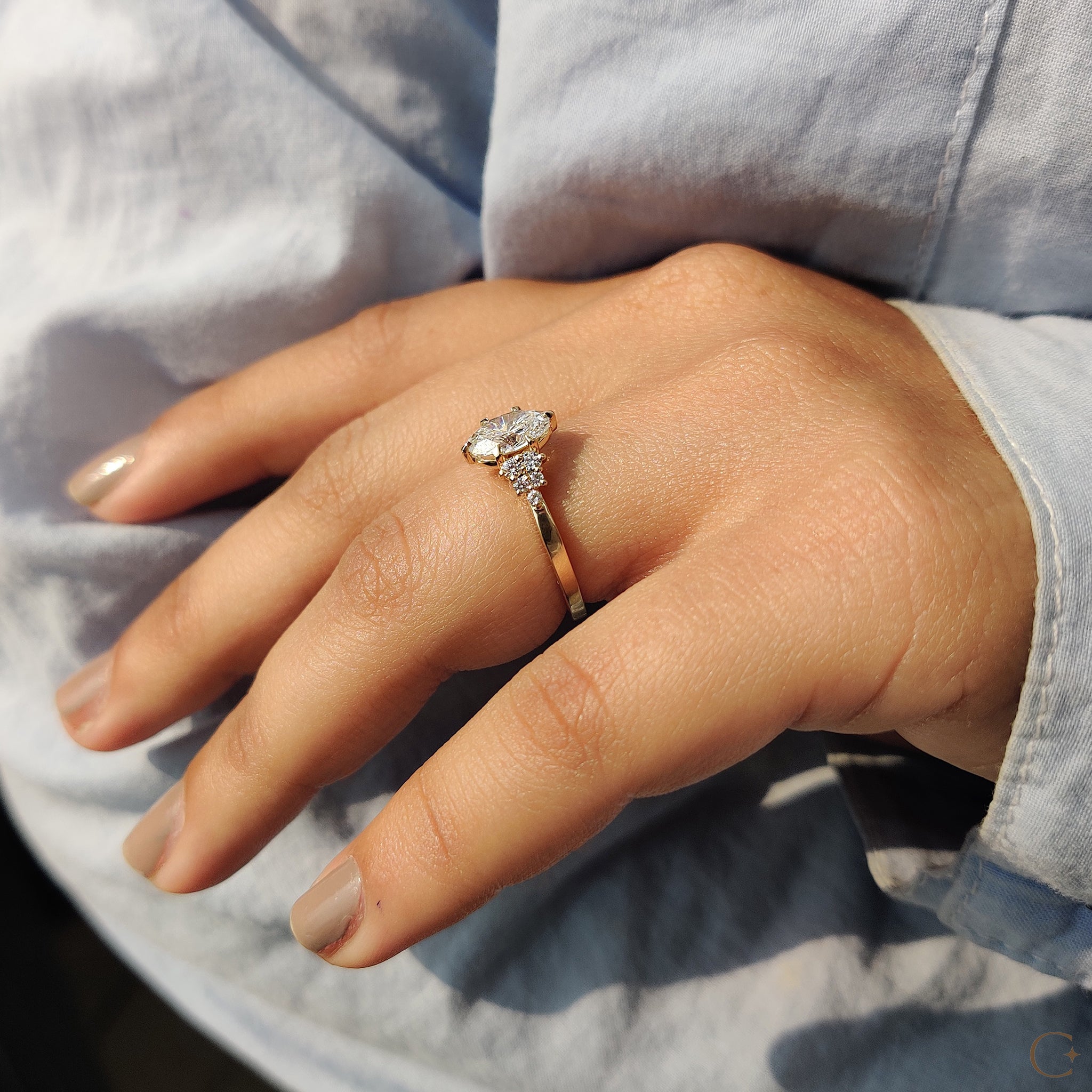 Oval Cut Engagement Ring In Cluster Setting