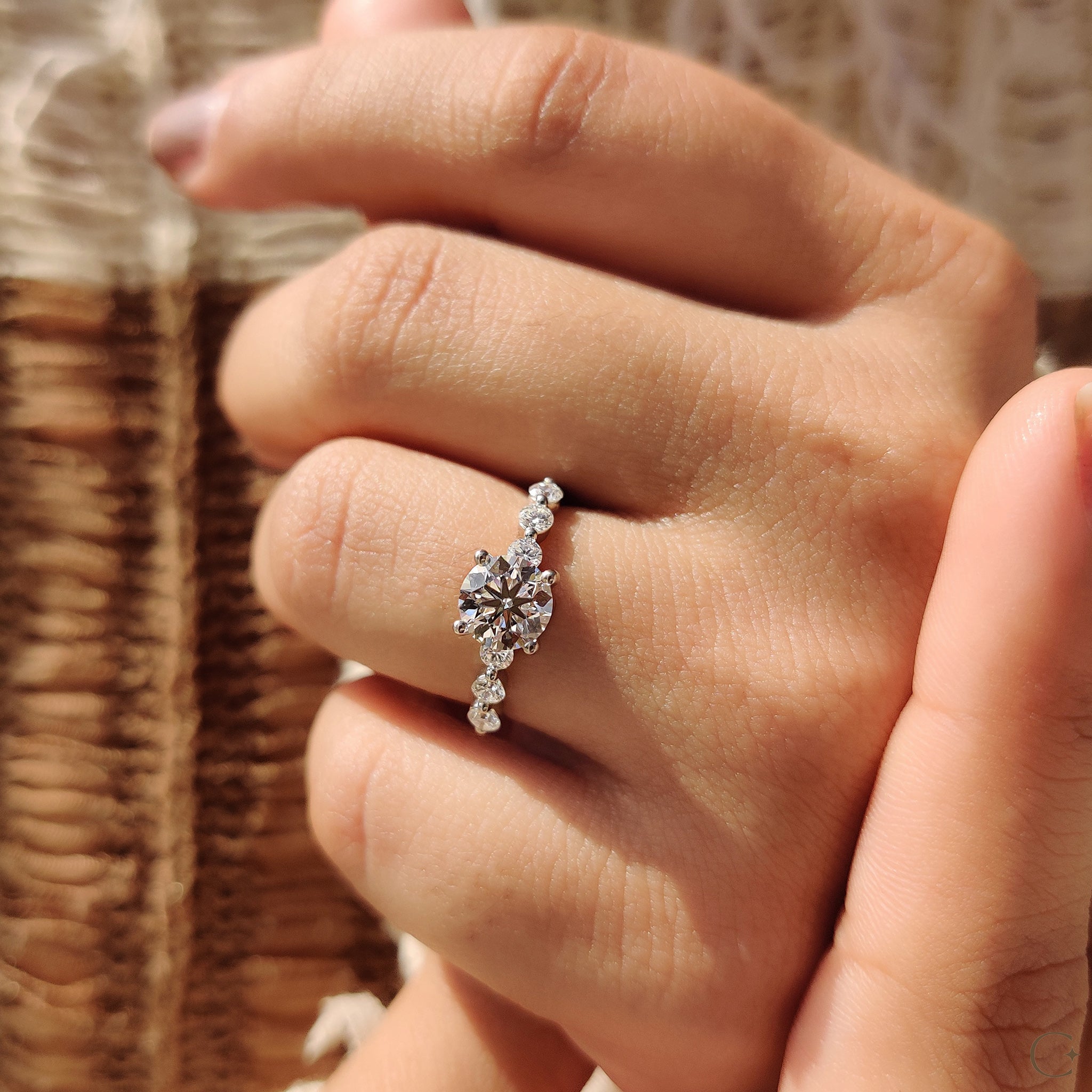 Round Brilliant Cut Diamond Ring With Round Cut Side Stones