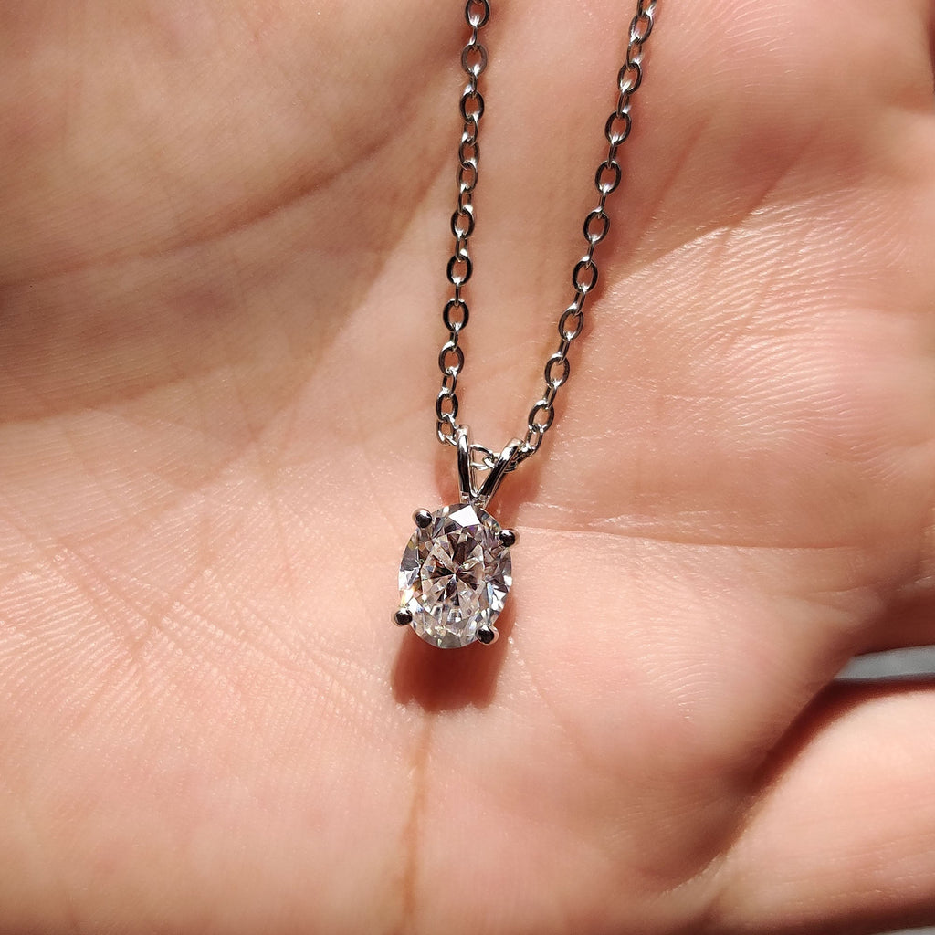 Oval Cut Moissanite Pendant In Solitaire Bunny Ear Bail
