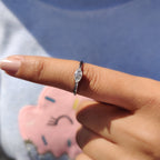 Round Side Stone With East West Marquise Ring