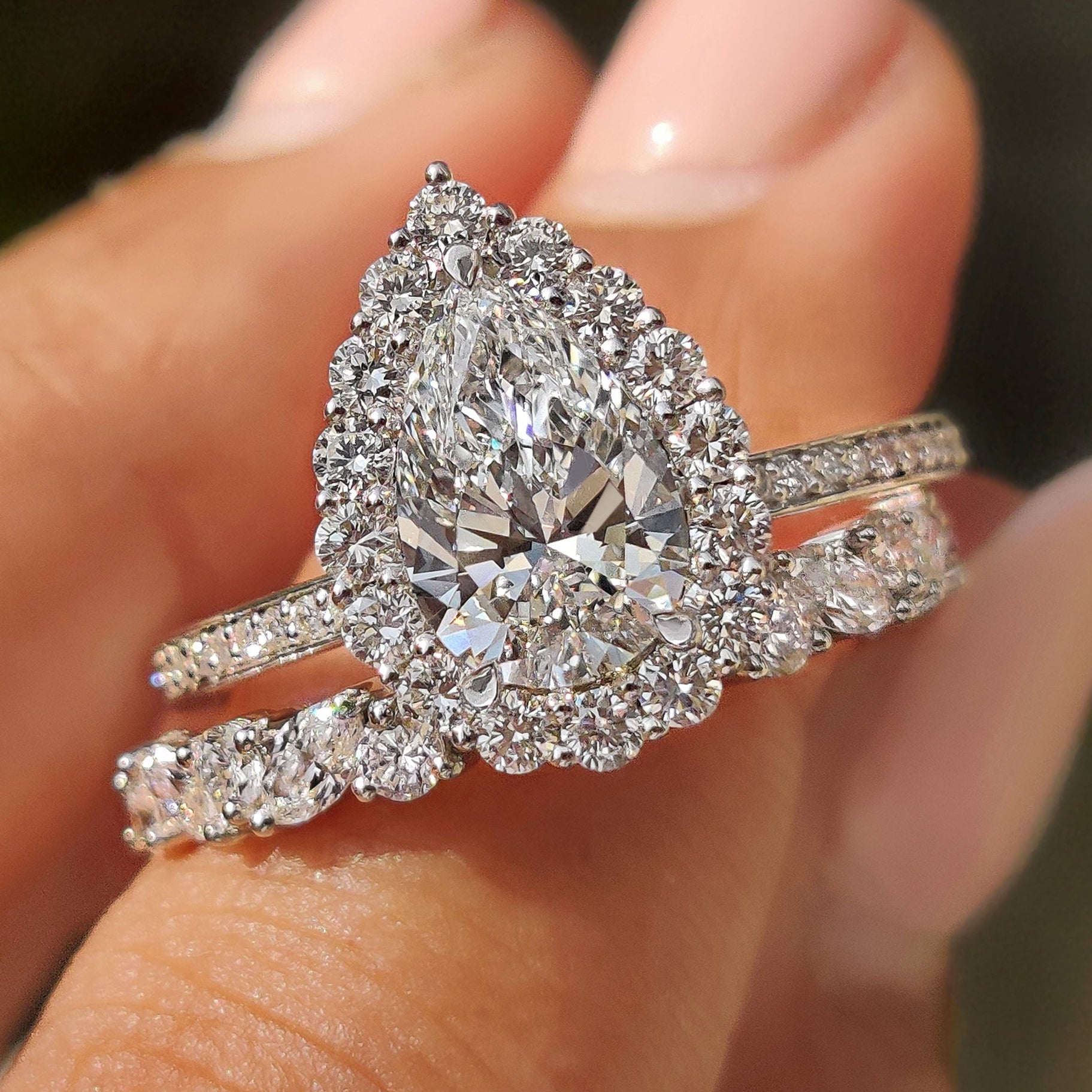 Pear Shaped Diamond Bridal Set With Round Halo Style