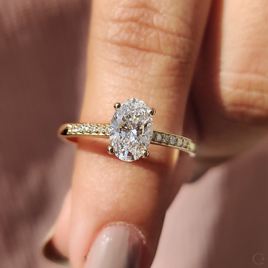 Oval Cut Diamond Ring In Pave Style