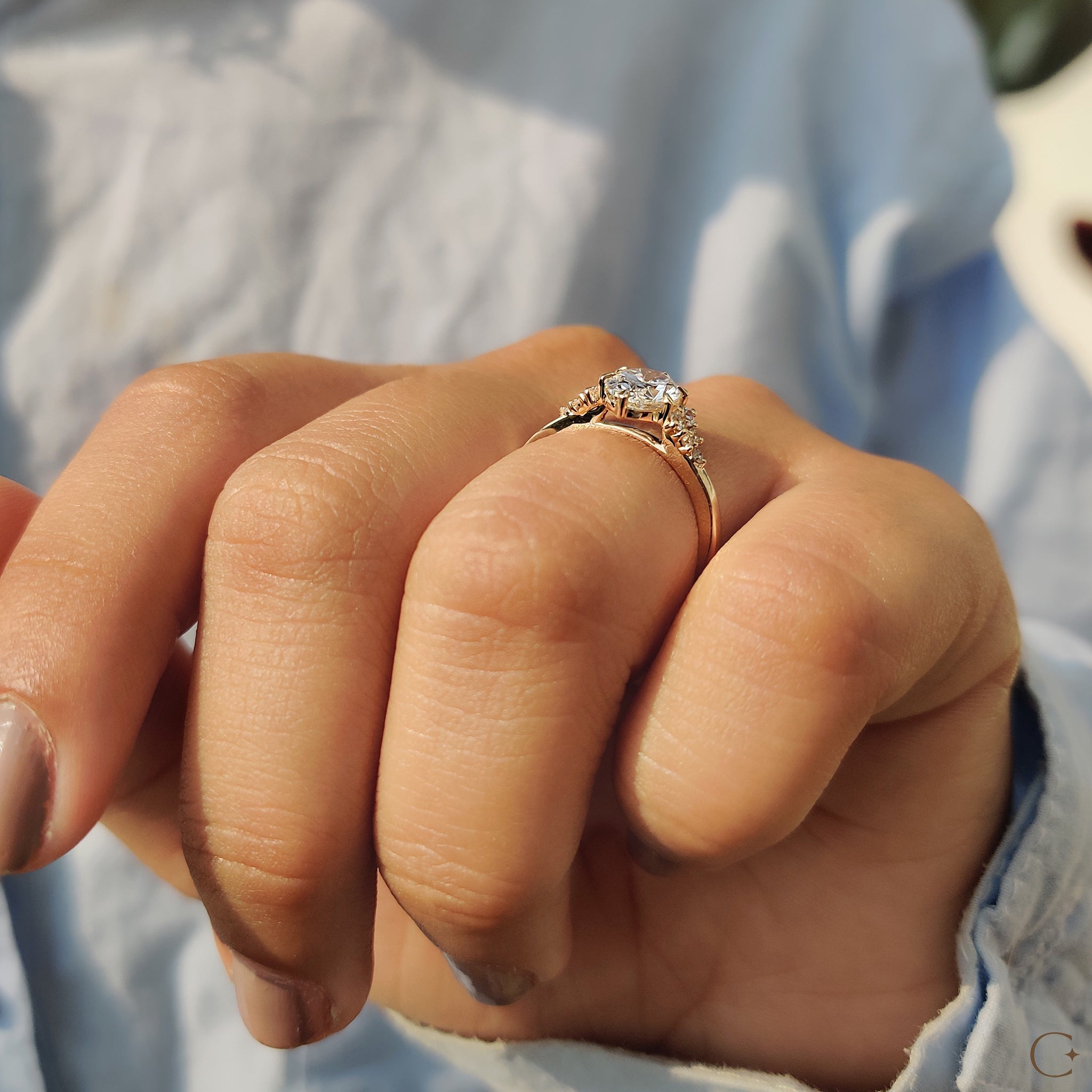 Oval Cut Engagement Ring In Cluster Setting